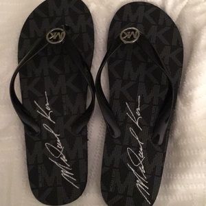 MK Flip flops never worn